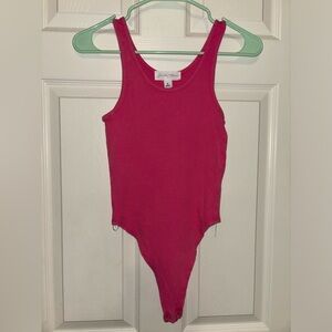 Hot pink body suit